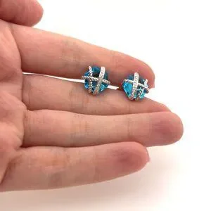 Cable wrap ring with blue topaz shop and diamonds